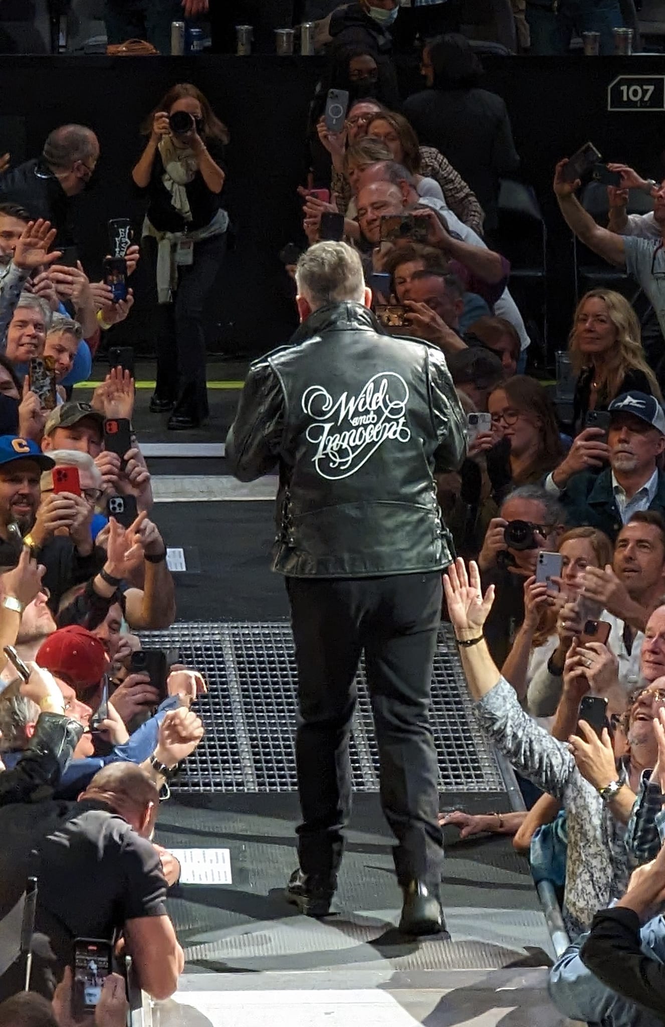 Bruce Springsteen with Wild & Innocent jacket from crowd during Atlanta coucert on World Tour 2023.